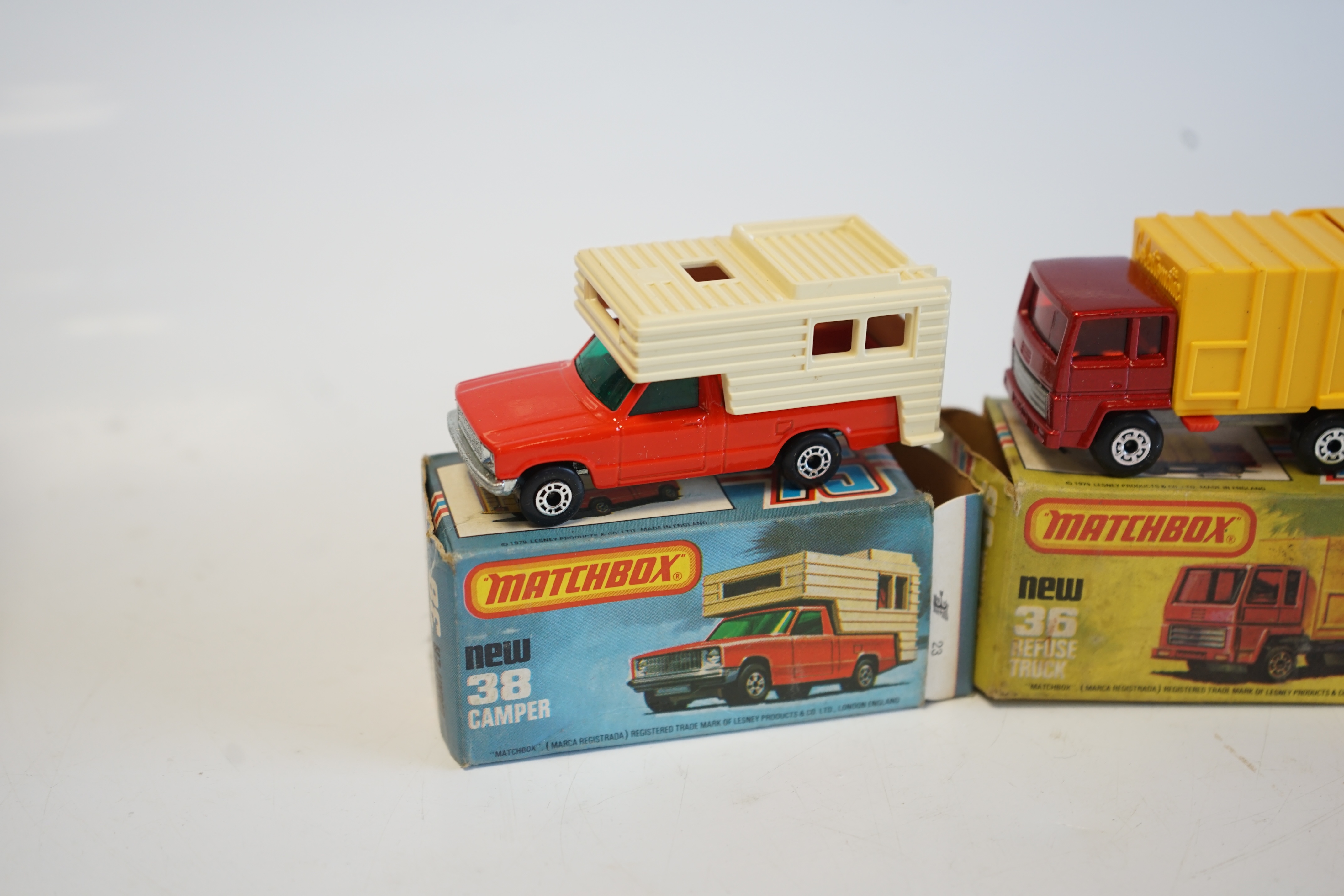 Seventeen boxed Matchbox Series 1-75 diecast vehicles including; 14; Petrol Tanker, 28; Formula Racing Car and another, 31; Caravan, 35; Zoo Truck, 36; Refuse Truck, 38; Camper, 45; BMW 30 CSL, 63; 4x4 Open Back Truck, 6